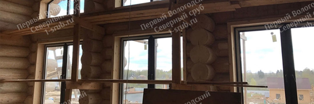 Отделка дома из бревна ручной рубки